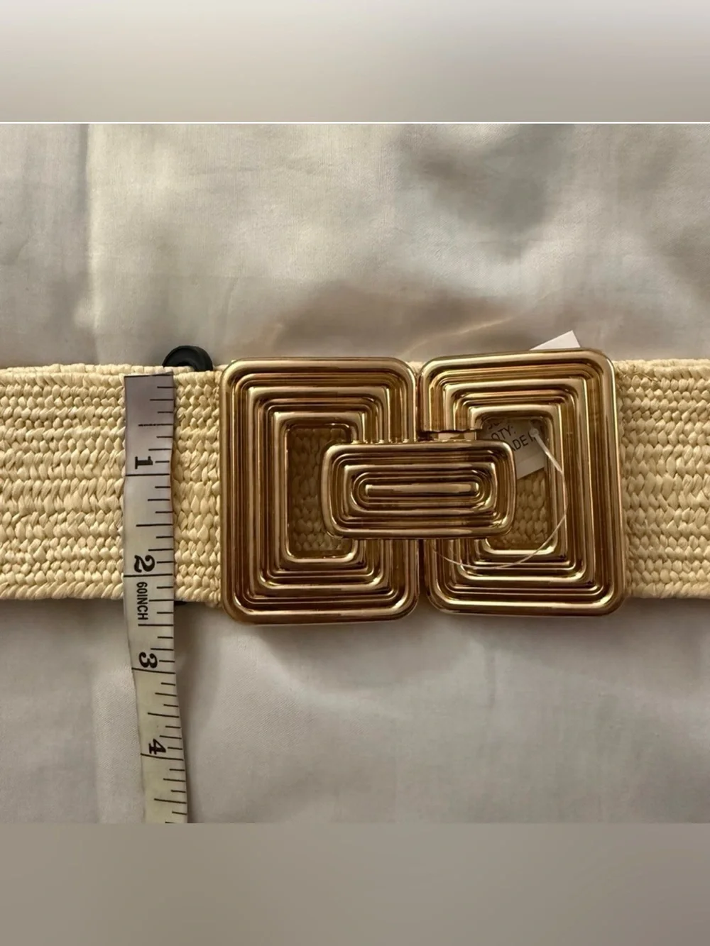 Beige paper stretchy waistband belt with gold tone buckle
